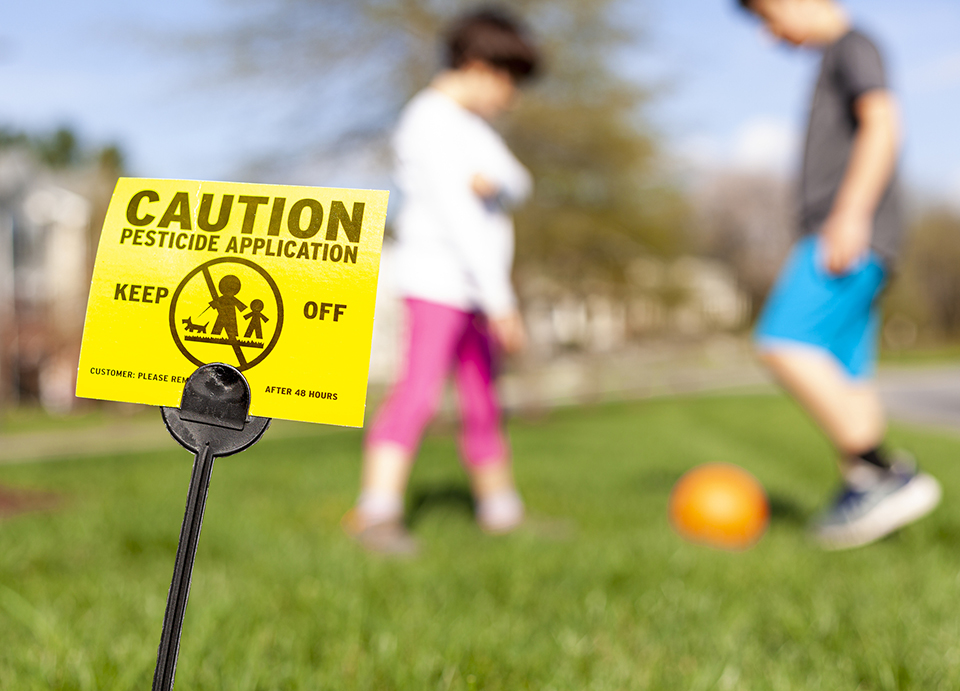 Pesticide Sign on Lawn