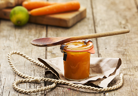 Handmade chutney from carrots, ginger and lime in jar