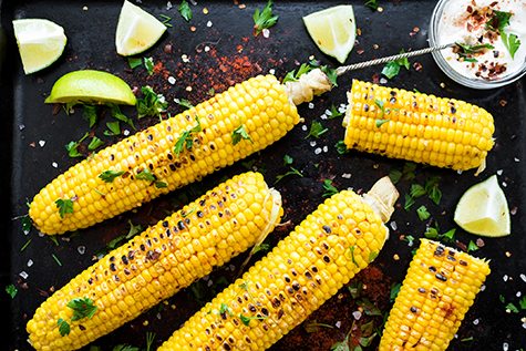 Grilled corn cobs in mexican style