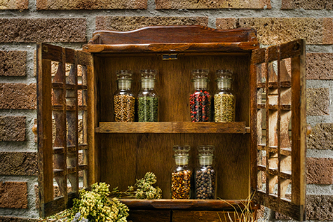 Vintage Wooden Spice Rack or Storage Cabinet and glass bottles