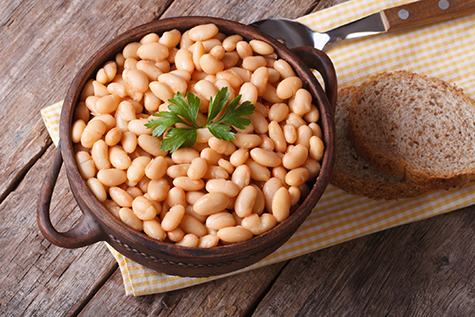 cooked white kidney beans in a bowl horizontal top view