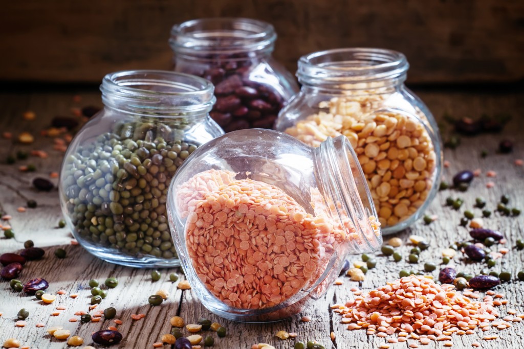 Red lentils in a glass jar, bean mix