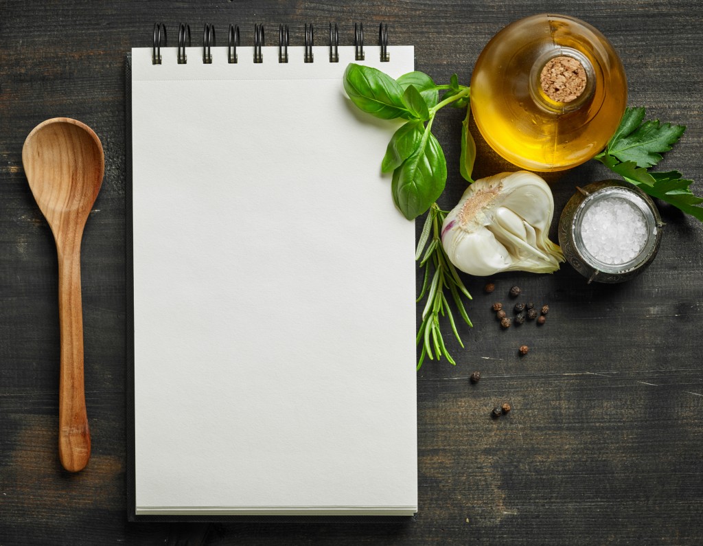 paper notebook and food ingredients