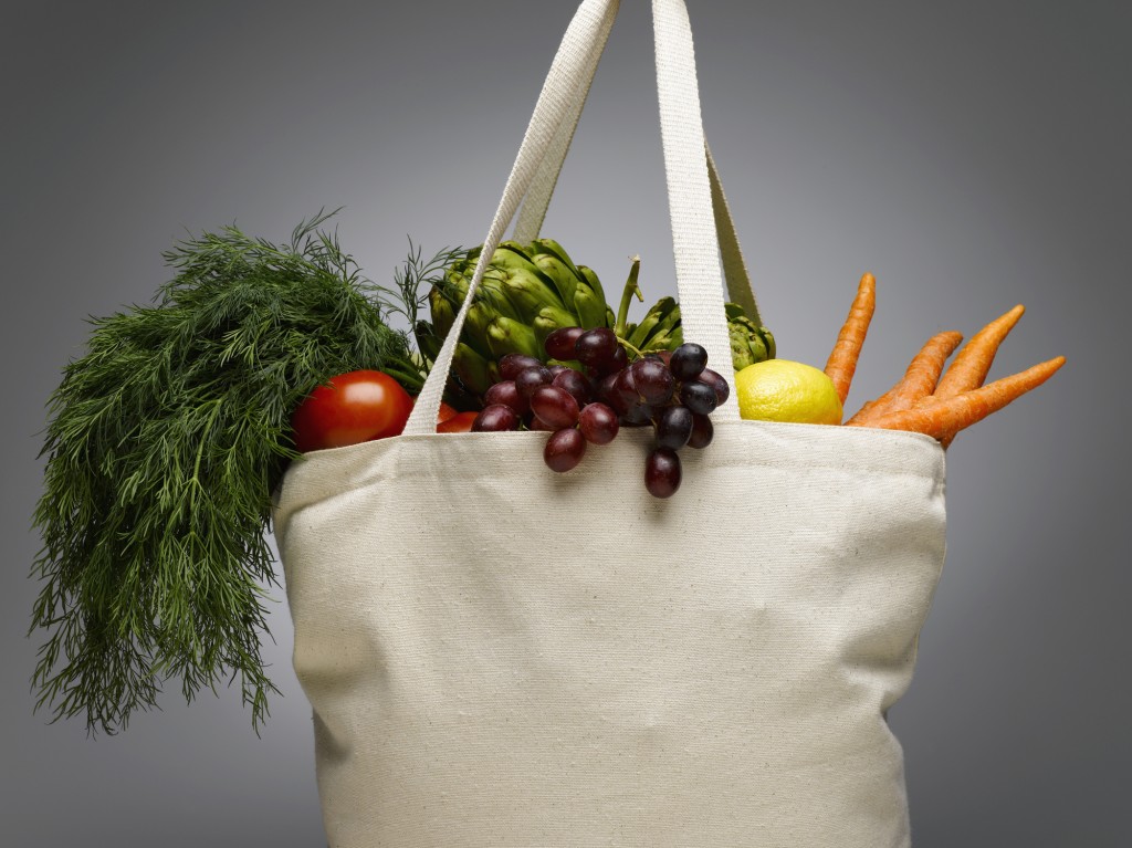 Shopping bag with fresh vegetables, close-up
