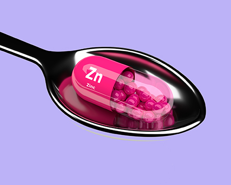 3d zinc pill on spoon over white