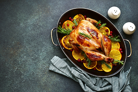 Roasted chicken with oranges ,rosemary and cranberries