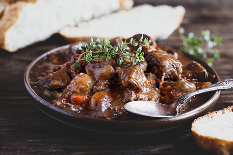 Delicious Bowl of Beef Bourguignon with Homemade Bread